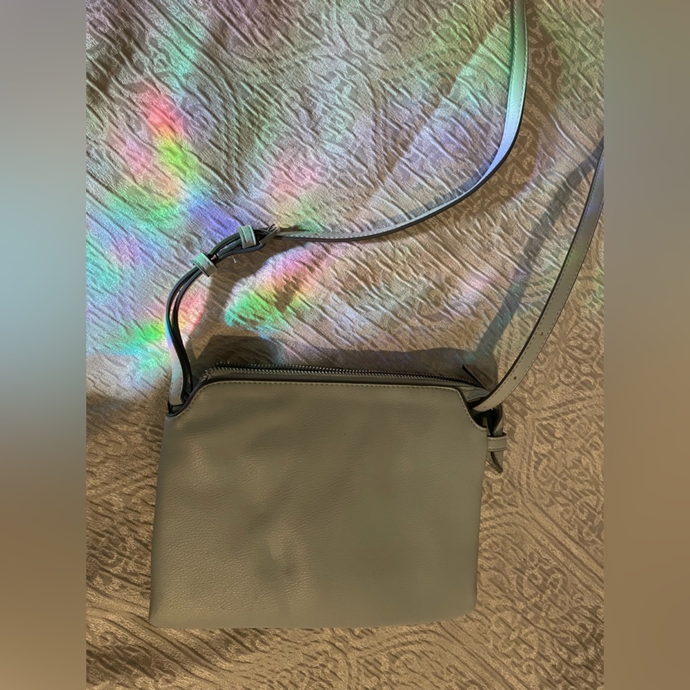 A new day light green crossbody bag